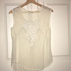 White tank with intricate stitching designs